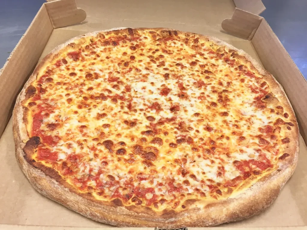 Whole cheese pizza with golden browned mozzarella in an open pizza box