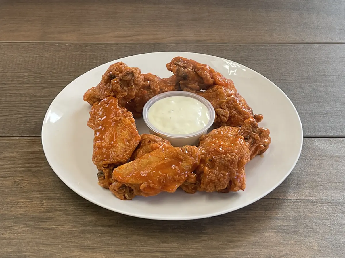 Bone-in chicken wings tossed in buffalo sauce with a cup of blue cheese
