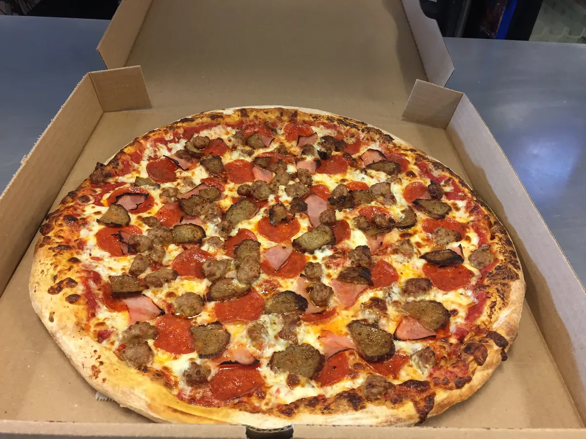 Meateor pizza with pepperoni, Canadian bacon, meatballs and Italian sausage
